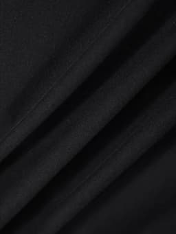 The black T-shirt features a red and white Cybernet system graphic with a triangular design and the word "SKYNET DIVISION" on it