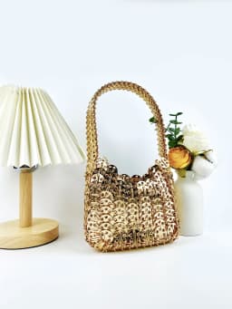 Hot selling fashion Korean version gold aluminum sheet, niche, high-quality, temperament, versatile woven handbag