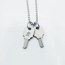 Unique design novel shape glossy and Simpli silvery keylock men pendant charms black border letter R necklace gentleman's jewelr