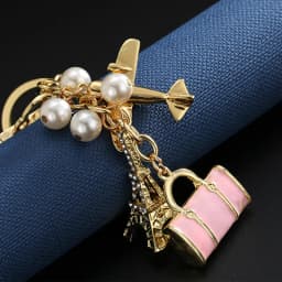 luxury jewelry New alloy pendant fashion travel handbag keychain aircraft tower accessories car bag pendant trending jewelries