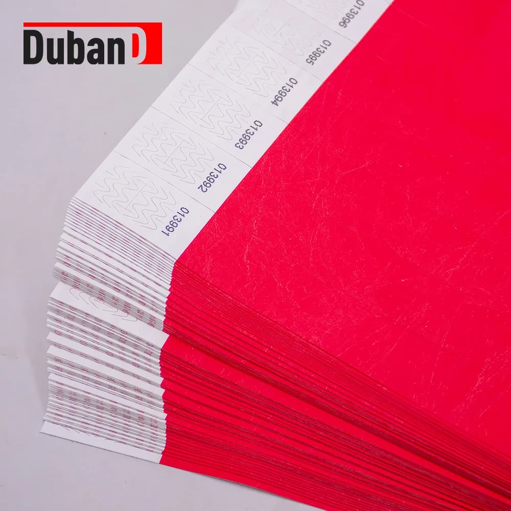 500-piece set of disposable solid-color wristbands, made of Tyvek waterproof paper, with options for coded and non-coded styles