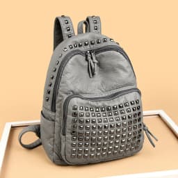 2025 New Super Cool Rivets Soft PU Fashion Backpacks Solid Zipper Large Capacity High Quality Designer Style Backpacks for Women