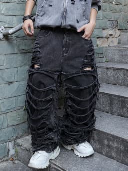Men's Black Jeans. With a Design of (Ripped Holes) and Tassels. In a Street Trend Style.