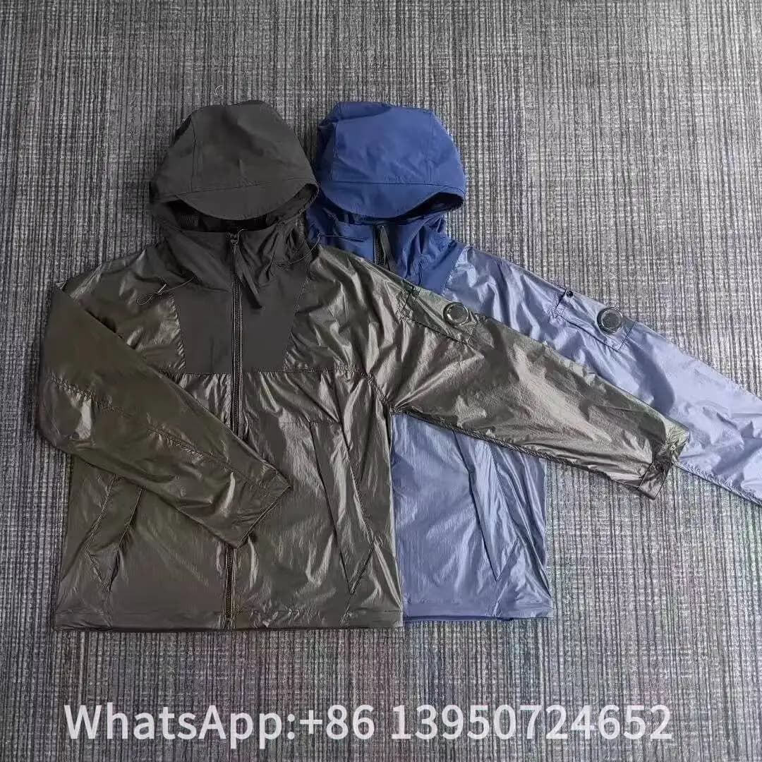 Style Men's Hooded Windproof Coat - Sleeve Lens Details, Professional Nylon Material. Zippered Street Fashion Outerwear.