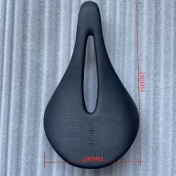 The New BALUGOE Carbon+Leather Road Bike Saddle MTB Bicycle Saddles Mountain Bike Racing Saddle PU Breathable Soft Seat Cushion