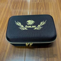 Sunline Portable Fishing Wheel Storage Bag EVA Wheel Protective Case Waterproof Reel Box Fishing Tackle Bag Fishing Accessories