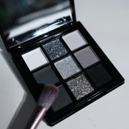 9-shade eyeshadow palette: Black Swan, Smoky, Dark Black, Grey Silver Glitter, Matte Finish, Long-lasting, and easy to color