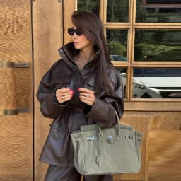 Street Waist Cinching Leather Jacket Women Loose Solid Stand Collar Zipper Pocket Jackets 2026 Spring Lady New Fashion Outwear