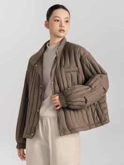 Janveny 2026 New Autumn Winter Lightweight Loose Puffer Down Coat Women Stand Up Collar Warm Casual White Duck Down Short Jacket
