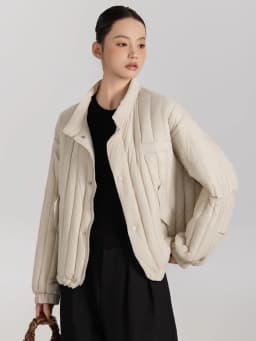 Janveny 2026 New Autumn Winter Lightweight Loose Puffer Down Coat Women Stand Up Collar Warm Casual White Duck Down Short Jacket
