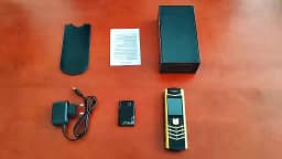 Luxury V10 Phone with Metal Leather Body Dual Card Slot Invisible Keyboard FM Radio And Camera - Premium Unisex Design