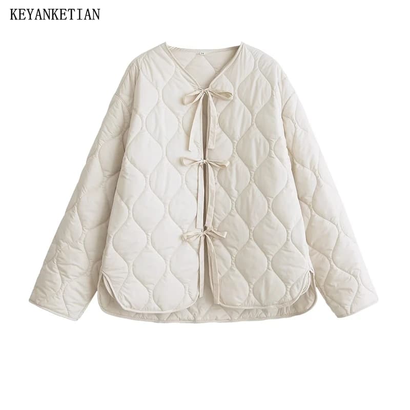 KEYANKETIAN 2024 Autumn/Winter New Women's Bow Lace-up Quilted Cotton Jacket Leisure style Asymmetrical Loose Thin Outerwear