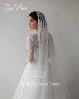 ZanBan Luxury Lace Beading A Line Wedding Dress Full Sleeves O Neck Bridal Gown Floor Length Modest Arabic Free Customized 2025