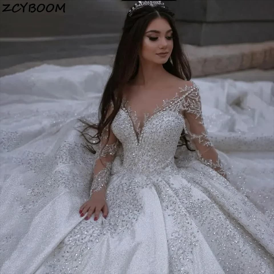 Customized New Luxurious Crystal Sequin Beaded Ball Gown Satin Wedding Dress Illusion Long Sleeves 2026 Court Train Bridal Gowns