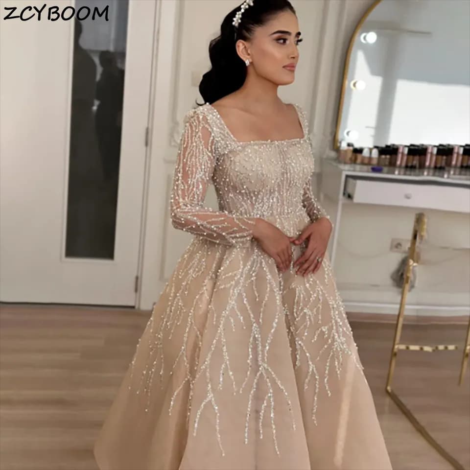 Customized Luxury Princess Crystal Beaded Boat Neck Long Sleeves Ball Gown Wedding Dresses 2026 Backless Court Train Bridal Gown