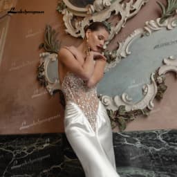 Luxurious Mermaid Wedding Dress Glossy Satin Bridal Gown Halter Deep V Backless Beaded Sheer Bodice Wedding Gowns Customized