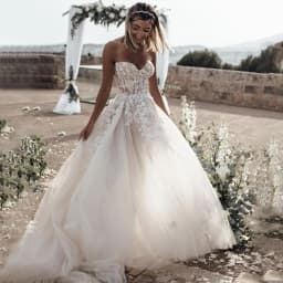 Customized Breathtaking Strapless Wedding Dress Featuring Stunning Crystals Lace Appliques and Flowy Silhouette Bridal Dress