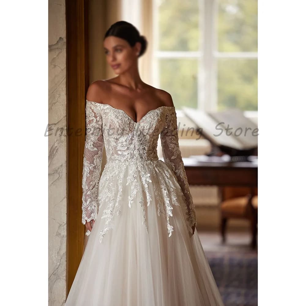 Off The Shoulder Long Sleeve Lace Wedding Dress Sweetheart V Neck Appliques Tulle A Line Bridal Gown With Train