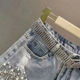 Women High-Waisted Rhinestone Pearl Fringe Denim Shorts Light Wash Distressed Design with Sparkly Tassel Trim Shorts