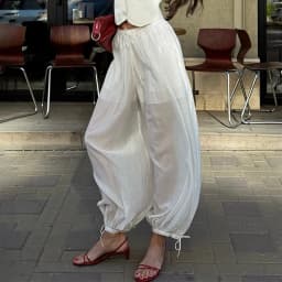 Linad Street Loose White Bloomers Pants Women Summer Elastic Waist Trousers Fashion Lace Up See Through Pants Female 2025 Sexy