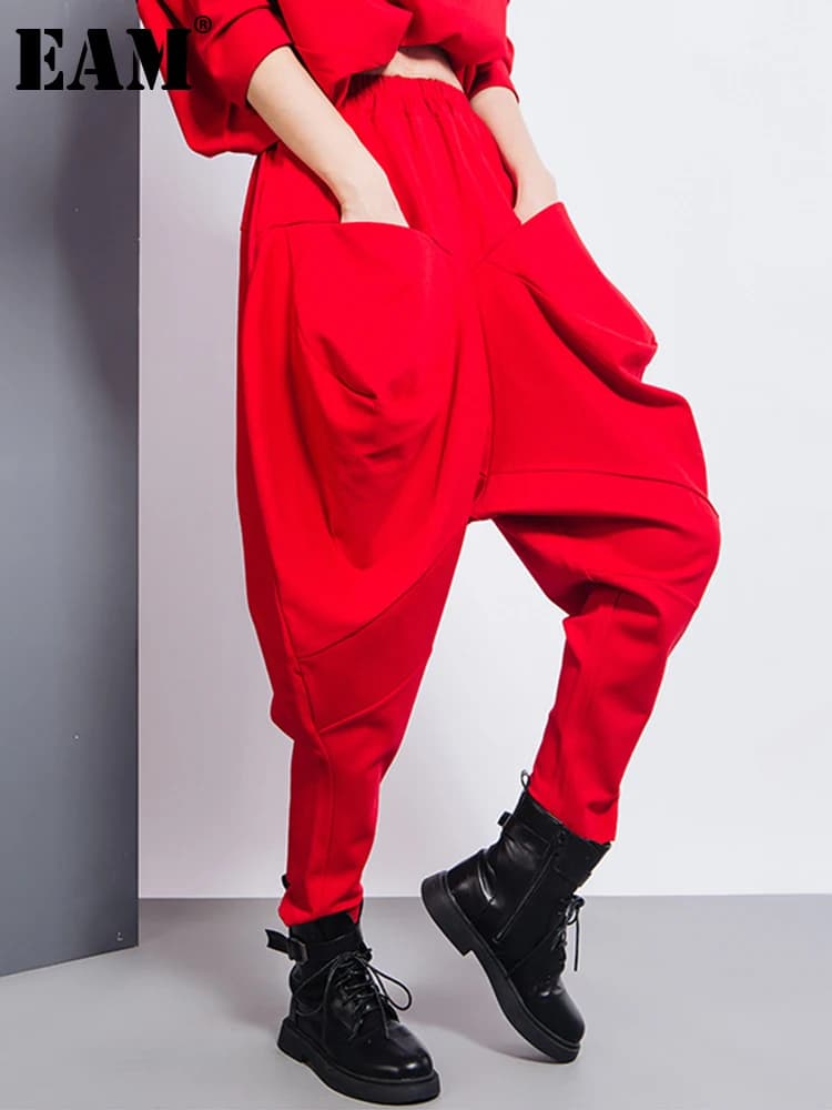 [EAM] Big Pockets Spliced Irregular High Waist Harem Trousers New Loose Fit Pants Women Fashion Tide Spring Autumn 2026 1DD2684