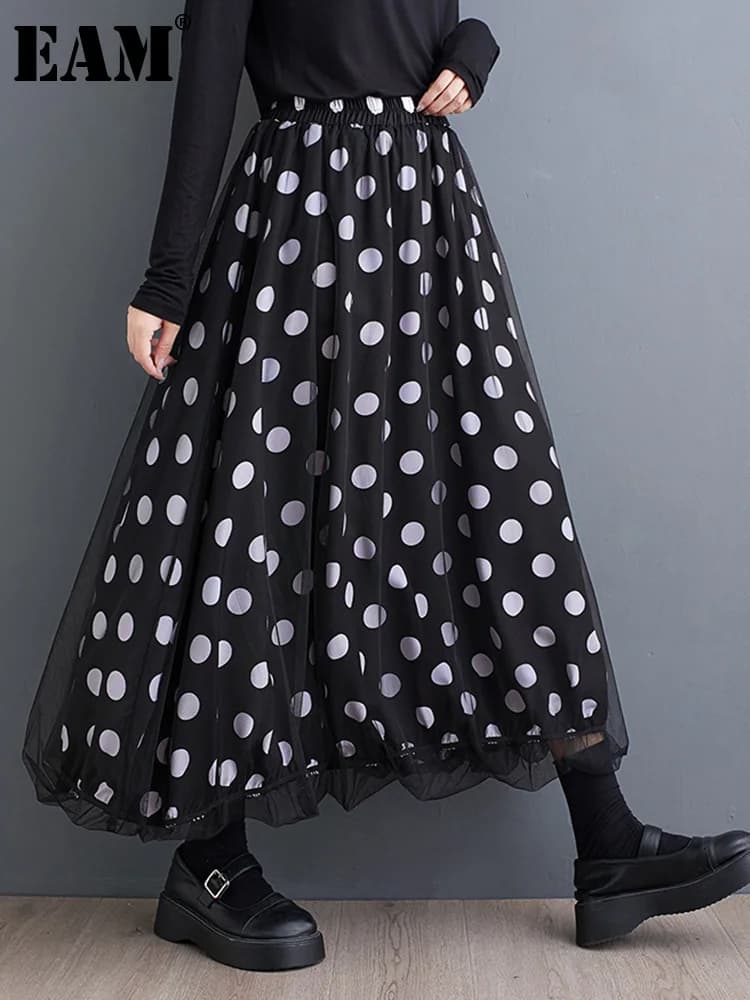 [EAM] High Elastic Waist Black Dot Printed Mesh Spliced A-line Half-body Skirt Women Fashion Tide New Spring Autumn 2026 1DJ0329