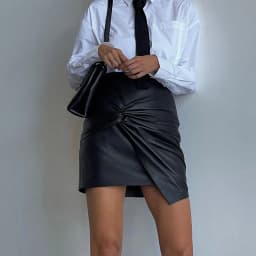 Women Design Sense French Leather Skirt Fashion High Waist Slimming Folds Knot Mini Skirts Sexy Package Hip PU Short Skirts