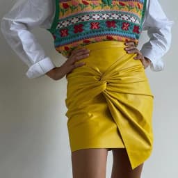 Women Design Sense French Leather Skirt Fashion High Waist Slimming Folds Knot Mini Skirts Sexy Package Hip PU Short Skirts