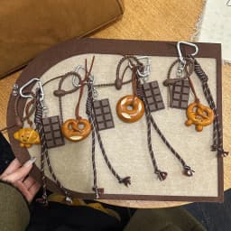 Lovely Exquisite Braided Rope Alkali Bread Braided Rope Bag Hang Chocolate Spring Buckle Pendant Senior Sense Pendant