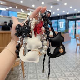 Bag Charms Purse Charms kit Keychains for Women,Cute Leather Cat Pearl bowknot Keychain Bag Charm for Handbag Accessories Tready
