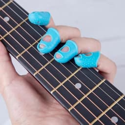 Silicone Finger Protectors 4PCS Soft Silicone Fingertip Grips Finger Sleeve Kalimba Thumb Picks Small Guitar Nails For Stringed