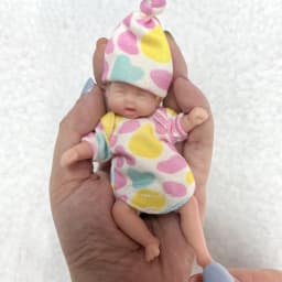 10cm Mini Palm Soft Full Solid Silicone Bebe Reborn Girl With Two Sets Outfits Handmade Cuddly Lifelike Reborn Dolls