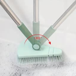 A long handled hard bristled triangular floor brush, bathroom tile gap cleaning brush