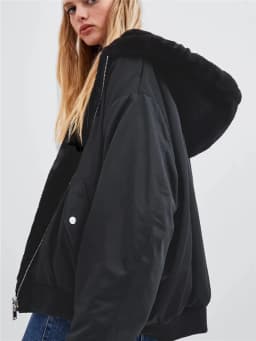 KEYANKETIAN Ladies Reversible Bomber Jacket Female Winter Faux Fur Panel Loose Hooded Zip Jacket Solid Mid Length Casual Top