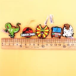 Original 1pcs Dilophosaurus PVC Shoe Charms Accessories Decorations Jurassic Dinosaurs Bus Designer Shoe Clips Buckle Kids Gifts
