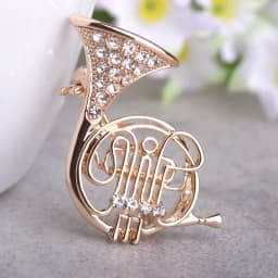 BUCOMEOI Trumpet Shaped Brooches Women Crystal Gold-color Costume Music Brooch Musician Shirts Hijab Pins Corsages