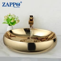 ZAPPO 23 Inch Bathroom Vessel Sink Gold Ceramic Sink Bowl Above Counter Oval Bathroom Sink with Waterfall Faucet Drain Combo