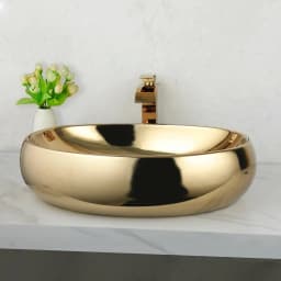 ZAPPO 23 Inch Bathroom Vessel Sink Gold Ceramic Sink Bowl Above Counter Oval Bathroom Sink with Waterfall Faucet Drain Combo