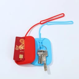 Hot New Creative gift silicone key case, multi-function drawstring silicone keychain, environmentally friendly silicone key case