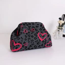 Trendy Cow Print Dot Handbag with High-End Color-Blocking Knitted Clip-On Design, Spacious and Versatile Fashion Tote.