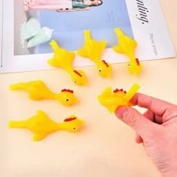 5-50pcs Novelty Catapulted Ejection Chicken Toy Light Rubber Finger Prank Flying Toy Slingshot Chicken Finger Toys Turkey Sticky