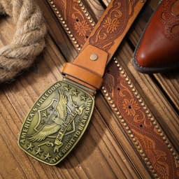 A western denim style PU material embossed belt metal plate QQ head men and women of the same daily leisure delivery punch nails