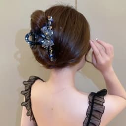 Elegant large acrylic bow hair clip with sparkling rhinestones - a fashionable solid color accessory for women and girls