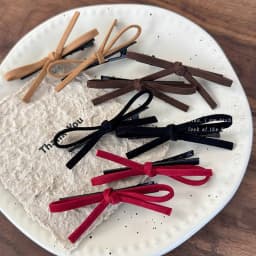 Side suede red bow bangs hairpin forehead headdress women's word clip edge clip autumn and winter 2024 new