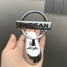 Metal Car Bonnet Sticker for Nissan Logo Altima Almera Titan Teana Leaf Qashqai Juke Note Narava Frontier Auto Hood Cover Emblem