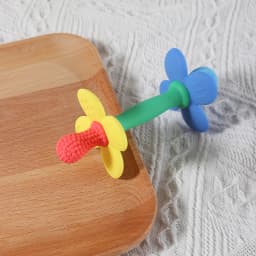 New 2 in 1 Baby Silicone Flower Teether - Safe & Soft Chewing Toy for Soothing Sore Gums, BPA-Free, Easy-to-Hold Teething Toy