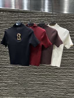 TWOTWINSTYLE Hollow Out Spliced Metal Buckle T Shirts For Women Turtleneck Short Sleeve Minimalist Slimming T Shirt Female 2025