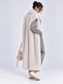 Women's Long Fluffy Faux Fur Vest Lapel Collar Sleeveless Oversized Winter Warm Elegant Luxe Chic Outerwear