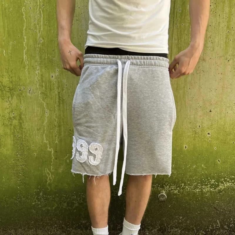 Trendy High Street Trend Loose Casual Personality999 Pattern Embroidery Elastic Waist Lace Up Sports five quarter Pants Men Wom