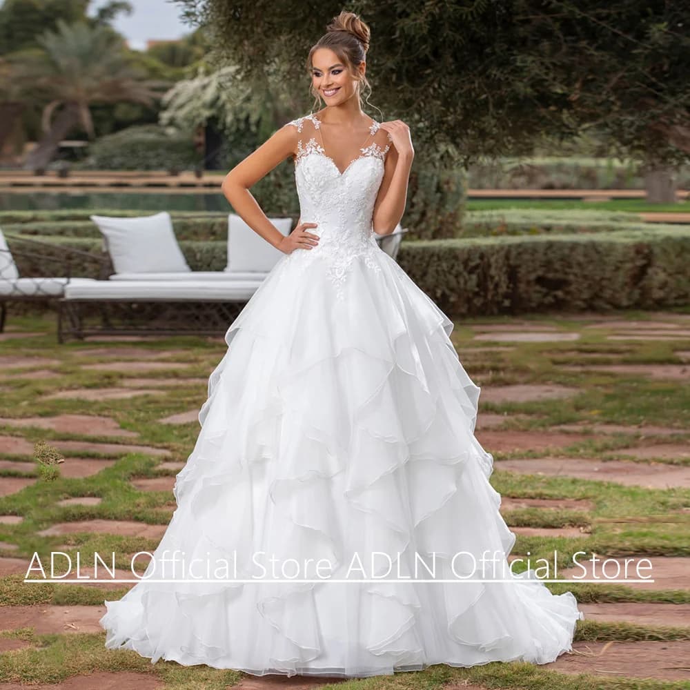 Ruffles Organza Wedding Dress Customized Cap Sleeve V Neck Applqiue Illusion Back Sweep Train A Line Bridal Gown for Bride